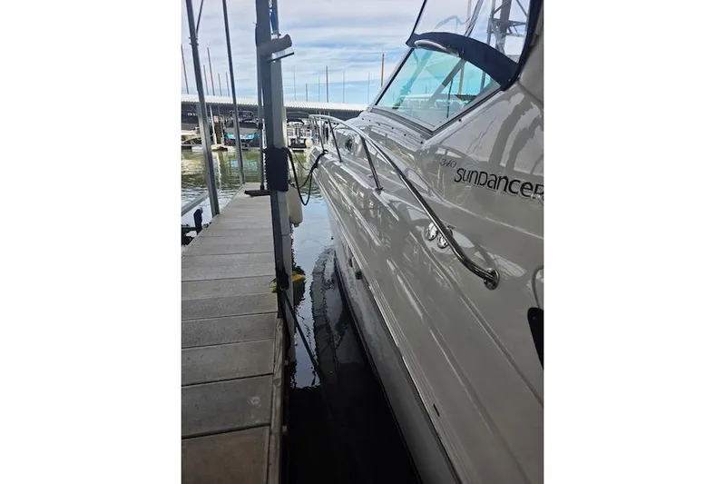  Yacht Photos Pics 2007 Sea Ray 340 Sundancer docked at marina, side view.