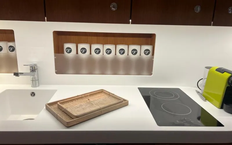  Yacht Photos Pics Modern kitchen area in 2019 Frauscher 1414 Demon yacht with sleek design and appliances.