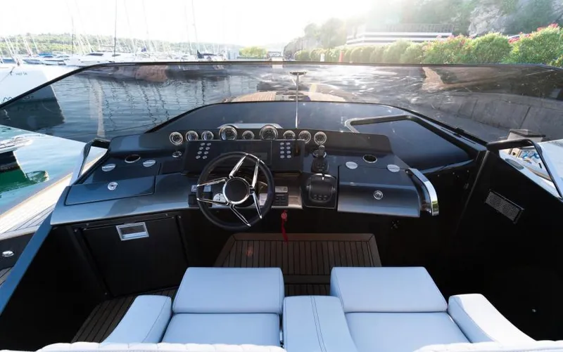 Yacht Photos Pics 2019 Frauscher 1414 Demon yacht cockpit with sleek design and modern controls.