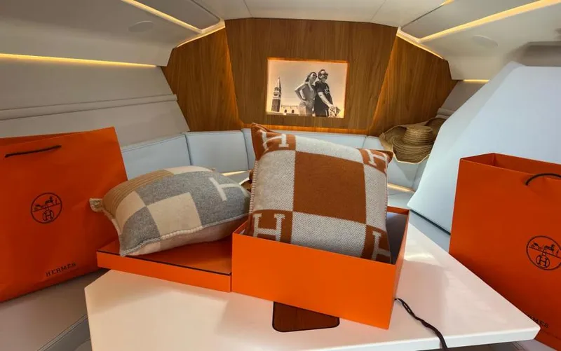  Yacht Photos Pics Luxurious interior of 2019 Frauscher 1414 Demon with Herm&egrave;s pillows and bags.