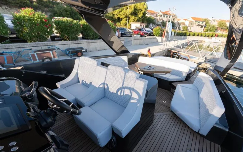  Yacht Photos Pics Luxurious 2019 Frauscher 1414 Demon yacht interior with elegant seating and modern design.