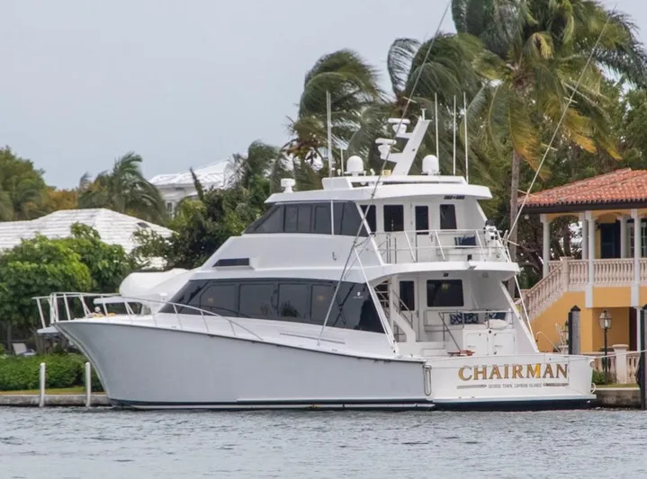Chairman Yacht Photos Pics Palmer Johnson 80 Sportfish M/Y 1997 yacht docked near waterfront homes.