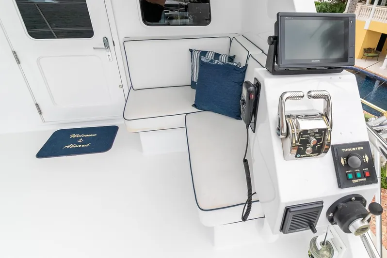 Chairman Yacht Photos Pics Palmer Johnson 80 Sportfish M/Y 1997 yacht cockpit with seating and navigation equipment.