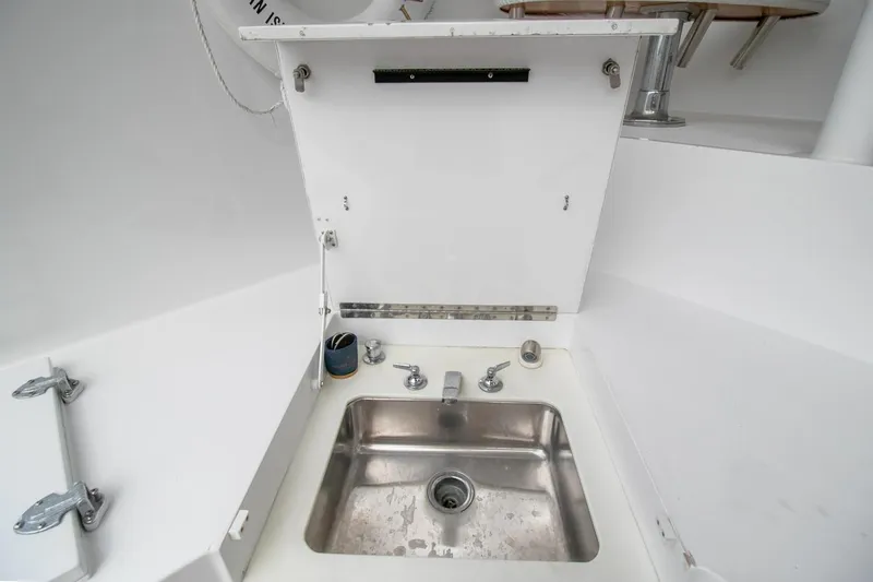 Chairman Yacht Photos Pics Stainless steel sink on 1997 Palmer Johnson 80 Sportfish yacht deck.