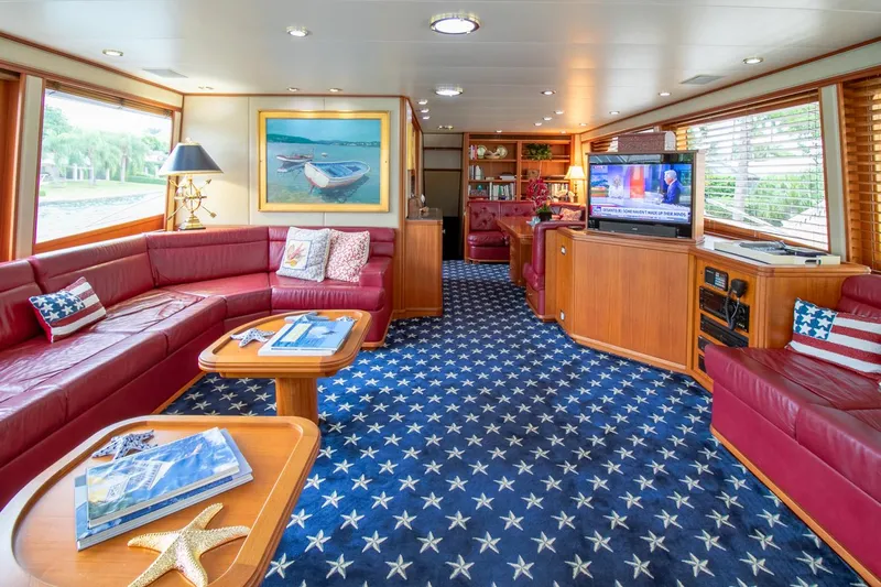 Chairman Yacht Photos Pics Luxurious interior of 1997 Palmer Johnson 80 Sportfish yacht with star-patterned carpet.