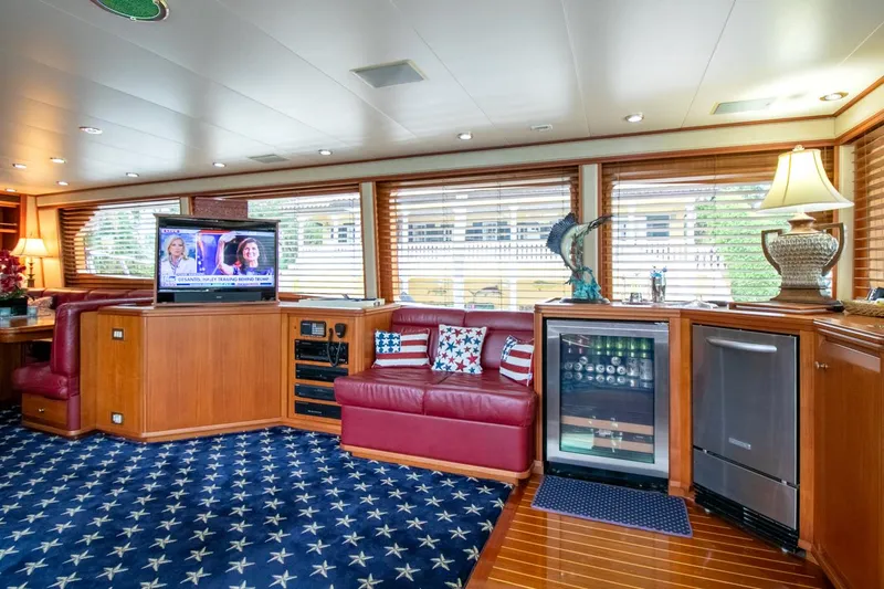 Chairman Yacht Photos Pics Luxurious interior of 1997 Palmer Johnson 80 Sportfish yacht with plush seating and entertainment system.