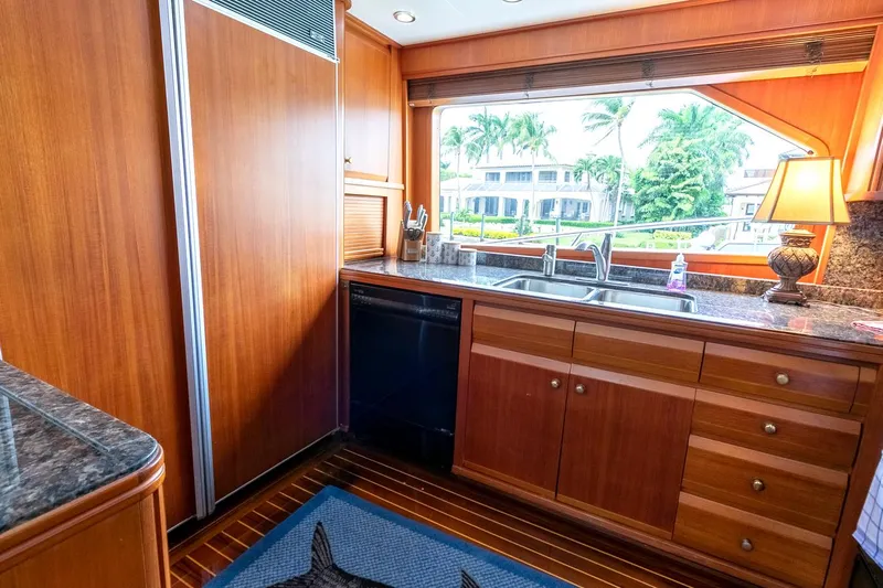 Chairman Yacht Photos Pics Luxurious kitchen interior of 1997 Palmer Johnson 80 Sportfish yacht with wood cabinetry.