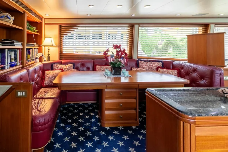 Chairman Yacht Photos Pics Luxurious interior of 1997 Palmer Johnson 80 Sportfish yacht with plush seating and elegant decor.
