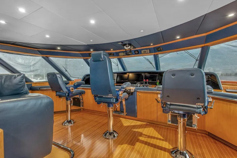 Boss Yacht Photos Pics Luxurious 1989 Feadship 116 Sport Fisher yacht interior with modern helm and seating.