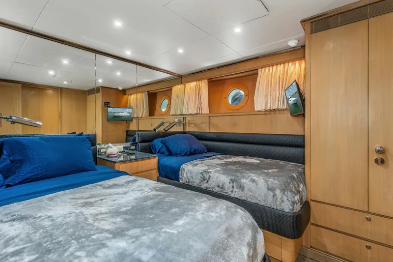Boss Yacht Photos Pics Luxurious cabin interior of 1989 Feadship 116 Sport Fisher yacht with twin beds.