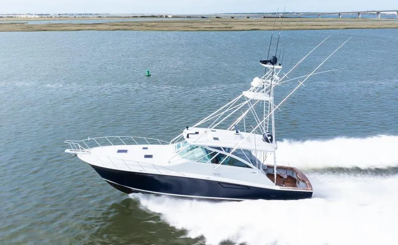 Reel Blessed Yacht Photos Pics 2006 Cabo 52 Open yacht cruising on open water.