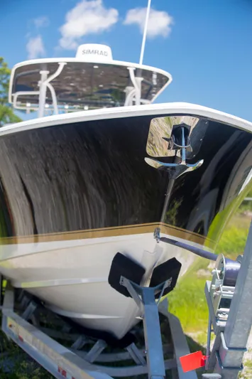  Yacht Photos Pics 2012 Contender 39 LS boat on trailer under clear blue sky.