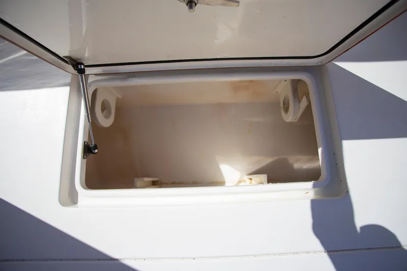  Yacht Photos Pics Open storage compartment on a 2012 Contender 39 LS boat.