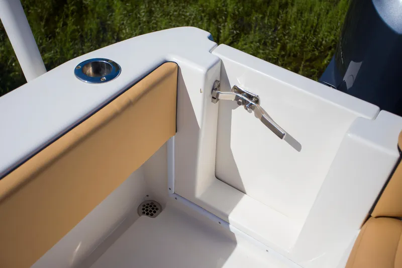  Yacht Photos Pics Contender 39 LS 2012 boat interior with tan upholstery and stainless steel fixtures.