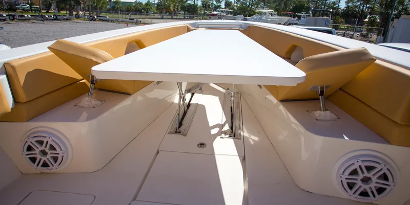  Yacht Photos Pics Contender 39 LS 2012 boat interior with seating and table setup.