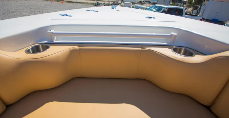  Yacht Photos Pics Contender 39 LS 2012 boat interior with tan seating and cup holders.