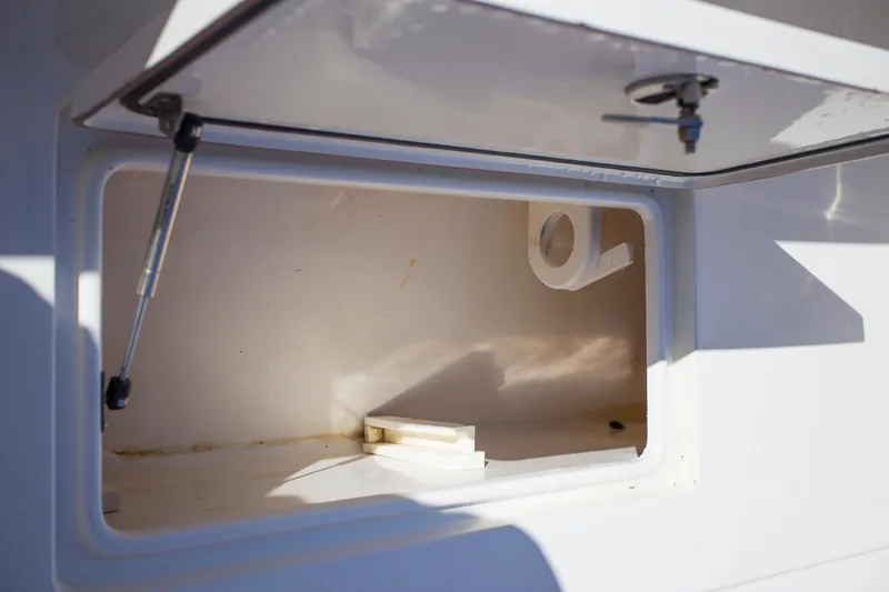  Yacht Photos Pics Open storage compartment on a 2012 Contender 39 LS boat.