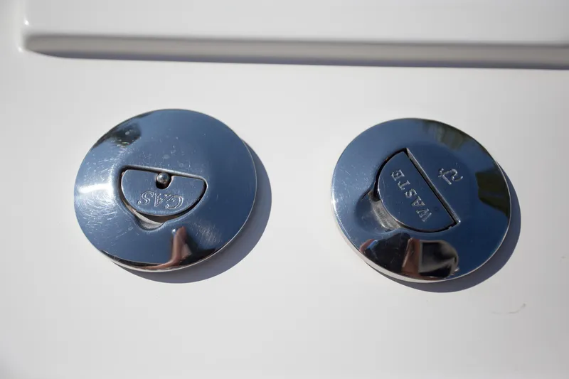  Yacht Photos Pics Chrome fuel and water caps on a 2012 Contender 39 LS boat.