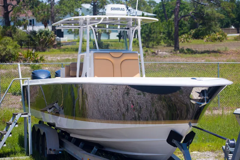  Yacht Photos Pics 2012 Contender 39 LS boat on trailer, parked outdoors, featuring sleek design and modern equipment.