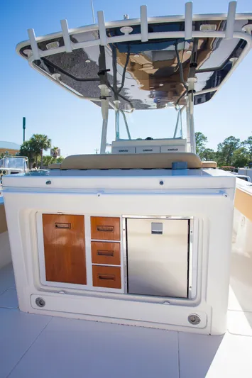  Yacht Photos Pics Contender 39 LS 2012 boat with storage drawers and stainless steel fridge under canopy.