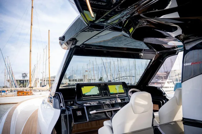  Yacht Photos Pics Interior view of 2026 Solaris Power 44 Sport Turismo yacht with advanced navigation system.