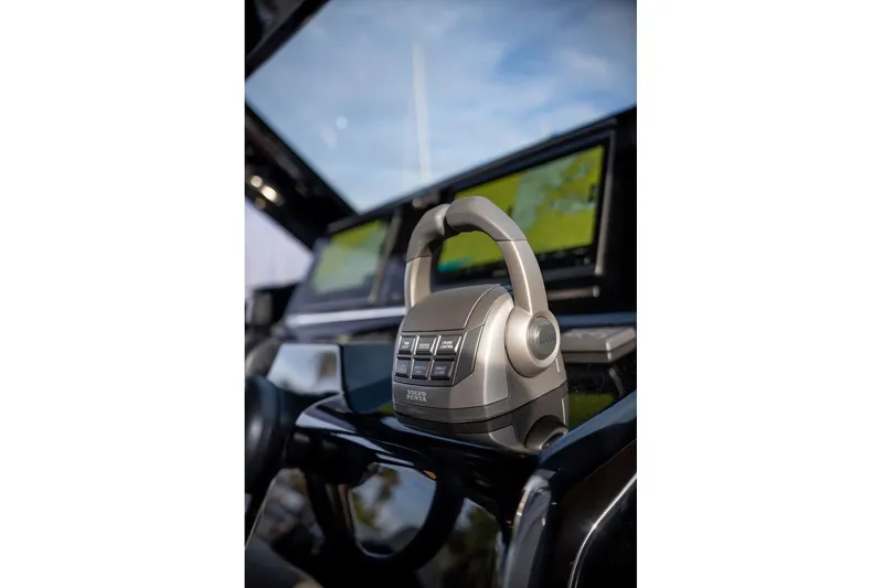  Yacht Photos Pics Control panel of 2026 Solaris Power 44 Sport Turismo yacht with navigation screens.