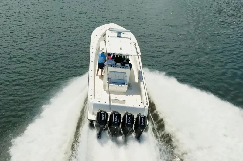  Yacht Photos Pics 2021 SeaVee 390Z boat cruising on water with four powerful engines.