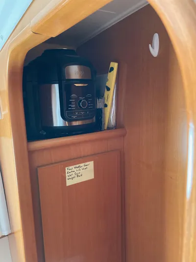 Rollercoaster Yacht Photos Pics Lagoon 420 kitchen cabinet with Instant Pot, 2007.