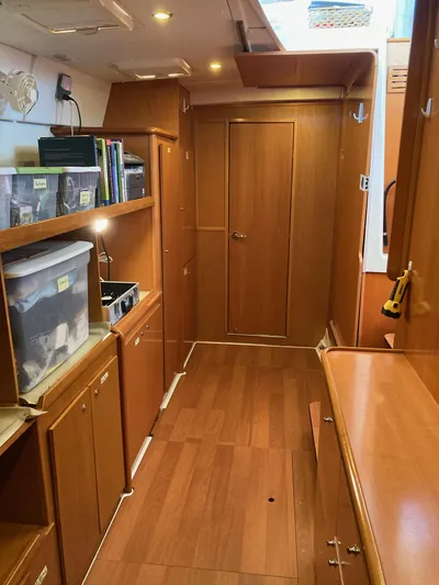 Rollercoaster Yacht Photos Pics Interior of a 2007 Lagoon 420 yacht with wooden paneling.