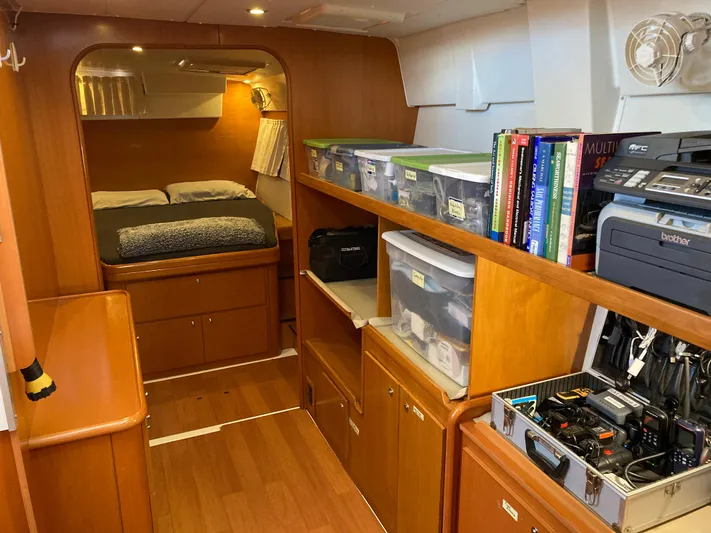 Rollercoaster Yacht Photos Pics Interior of a 2007 Lagoon 420 yacht with sleeping area and storage.