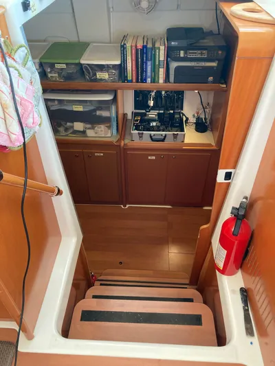 Rollercoaster Yacht Photos Pics Interior of Lagoon 420 yacht with stairs and storage area.