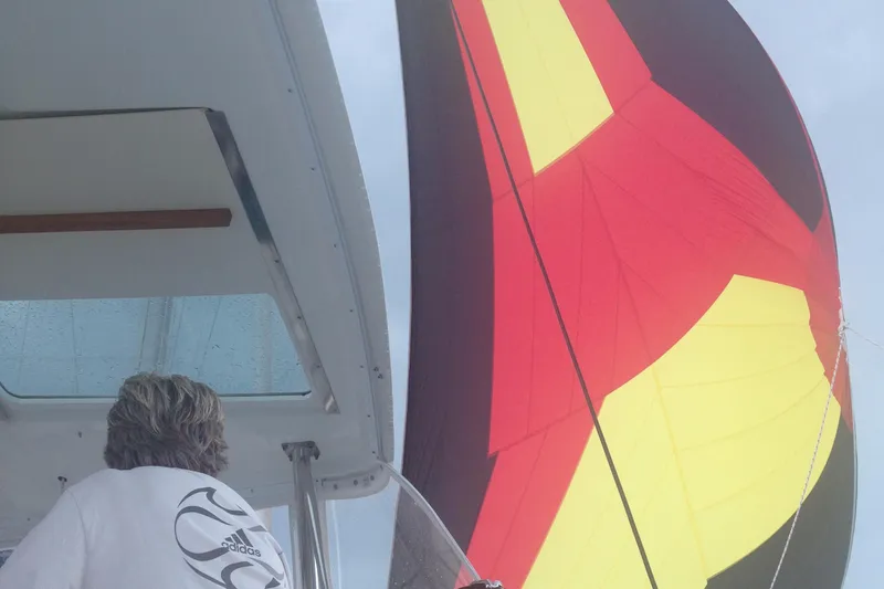 Rollercoaster Yacht Photos Pics Lagoon 420 sailboat with colorful sail, year 2007.