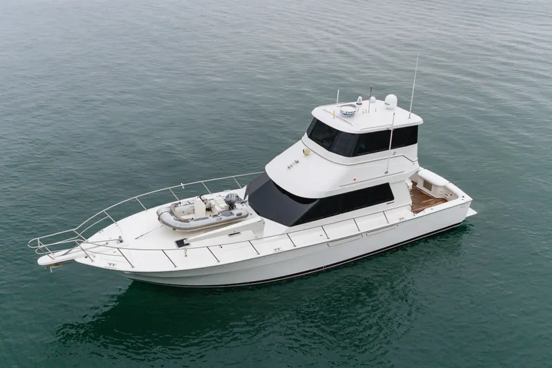 Pole Dancer Yacht Photos Pics 2005 Mediterranean 54 yacht on calm water, aerial view.