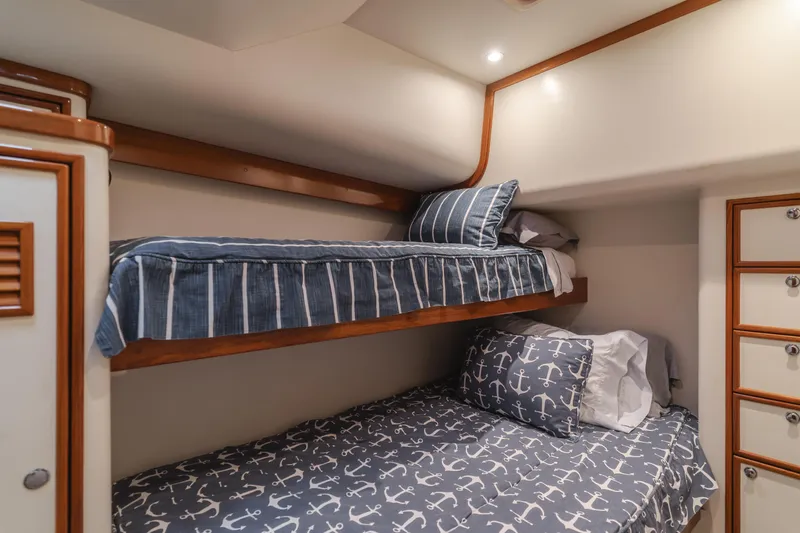 Pole Dancer Yacht Photos Pics Bunk beds in a 2005 Mediterranean 54 yacht cabin with nautical-themed bedding.