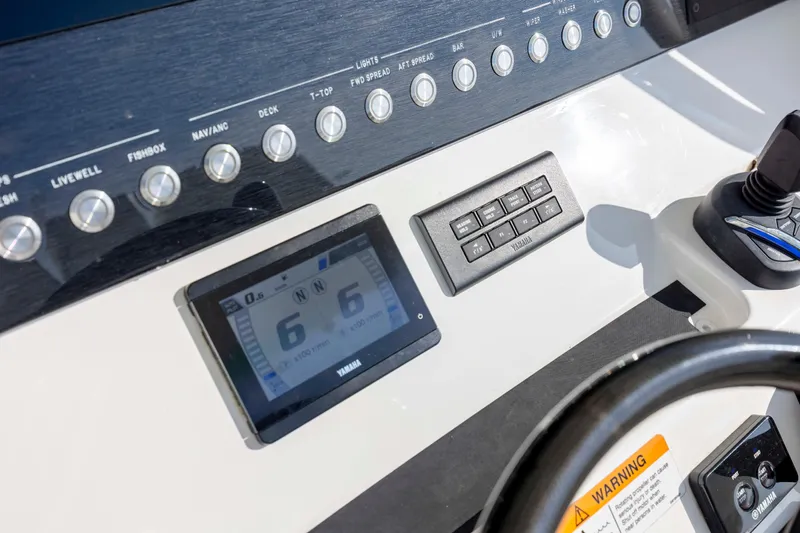  Yacht Photos Pics Control panel of 2022 Regulator 31 boat with Yamaha display and buttons.