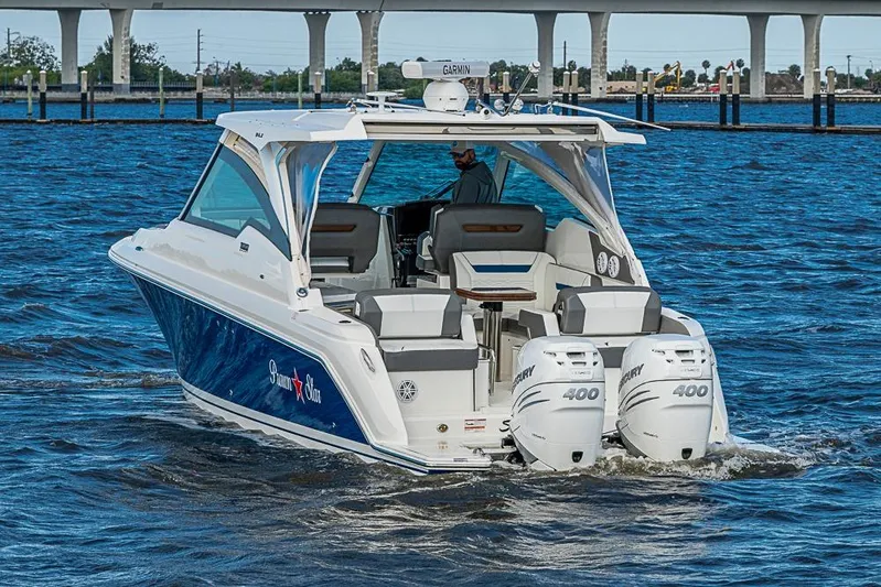 Prawn Star Yacht Photos Pics 2022 Tiara Yachts 34 LX cruising on water with twin Mercury 400 engines.