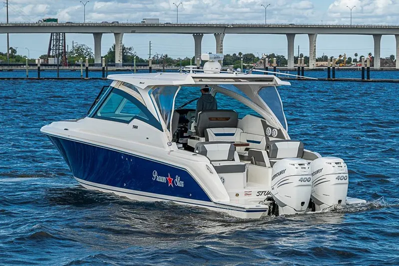 Prawn Star Yacht Photos Pics 2022 Tiara Yachts 34 LX boat cruising on water with twin Mercury 400 engines.