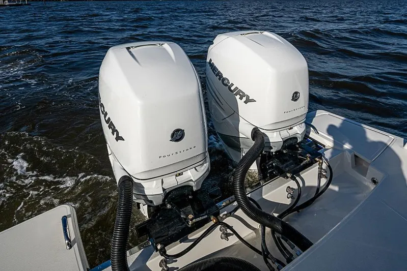 Prawn Star Yacht Photos Pics 2022 Tiara Yachts 34 LX with dual Mercury outboard engines on water.