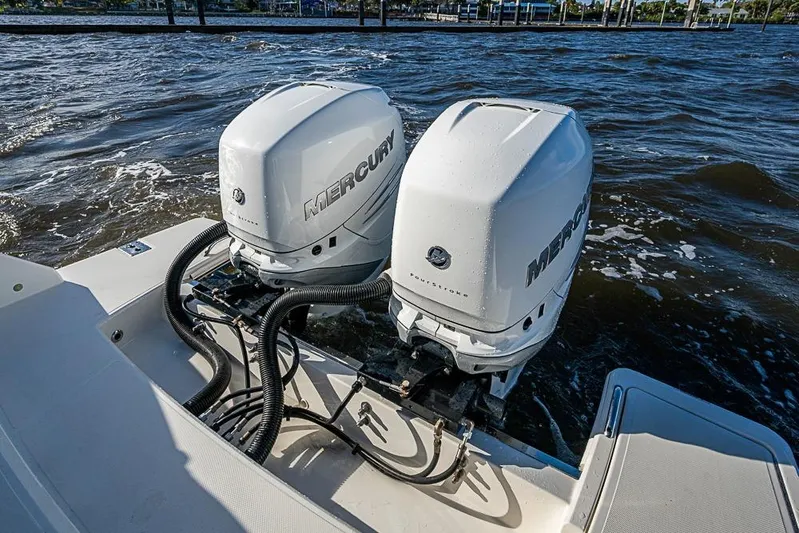 Prawn Star Yacht Photos Pics 2022 Tiara Yachts 34 LX with dual Mercury outboard engines on water.