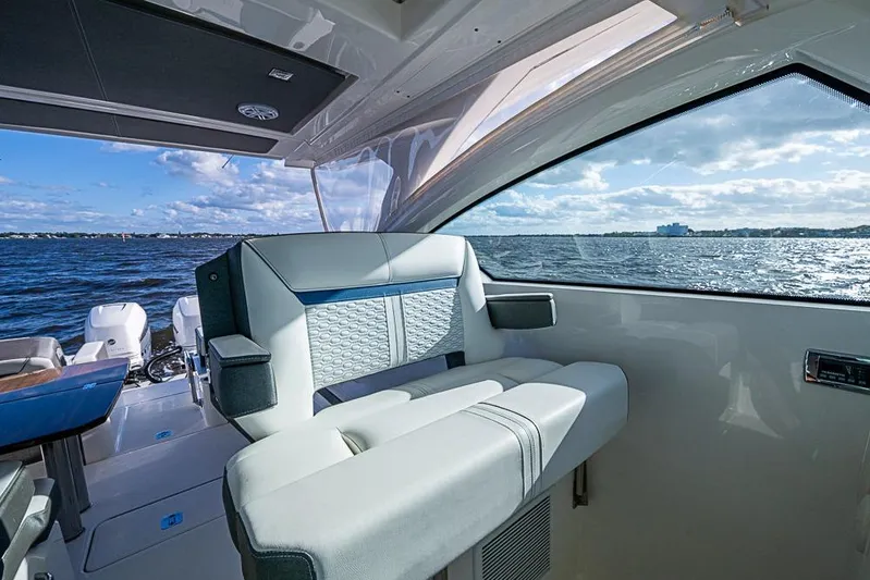 Prawn Star Yacht Photos Pics Interior view of 2022 Tiara Yachts 34 LX with ocean backdrop.