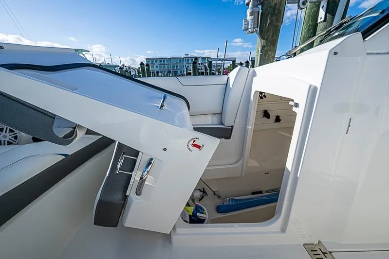 Prawn Star Yacht Photos Pics 2022 Tiara Yachts 34 LX interior view with open hatch and seating area.