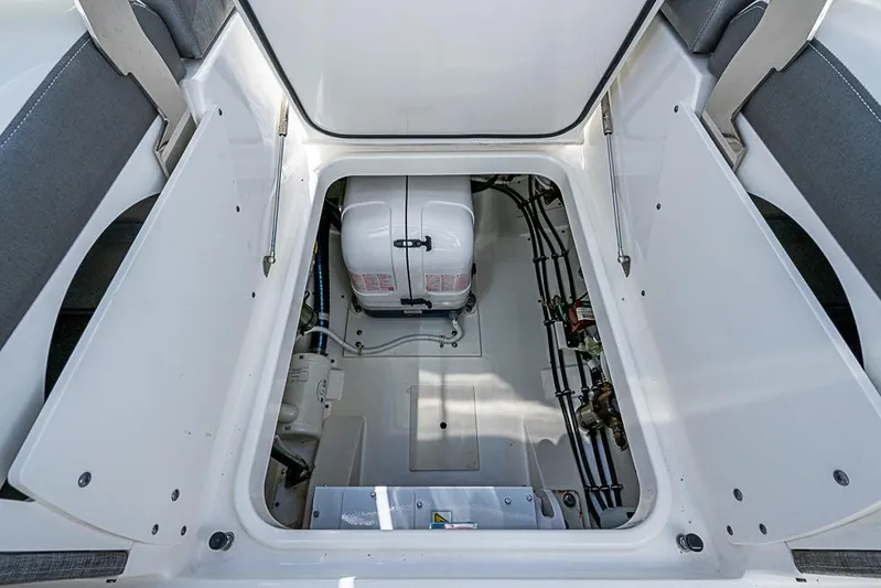 Prawn Star Yacht Photos Pics Engine compartment of 2022 Tiara Yachts 34 LX, showcasing clean and organized layout.