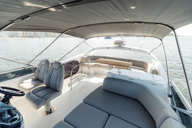  Yacht Photos Pics Luxurious 2023 Princess F50 yacht interior with elegant seating and panoramic ocean view.