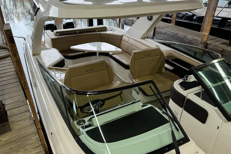 Yacht Photos Pics 2019 Sea Ray SLX 310 Outboard boat with luxurious seating and sleek design.