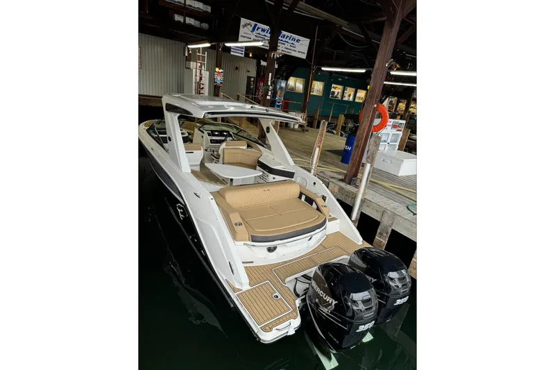  Yacht Photos Pics 2019 Sea Ray SLX 310 Outboard boat docked with twin Mercury engines.