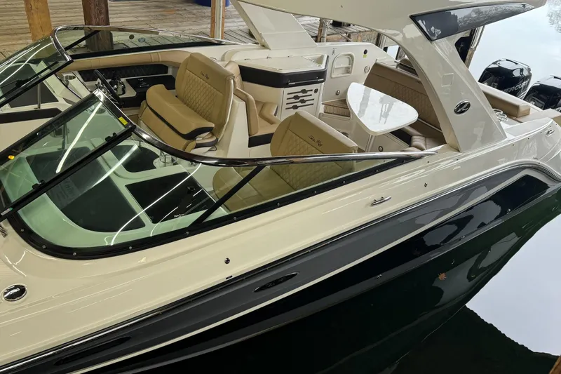  Yacht Photos Pics 2019 Sea Ray SLX 310 Outboard boat with luxurious seating and sleek design.