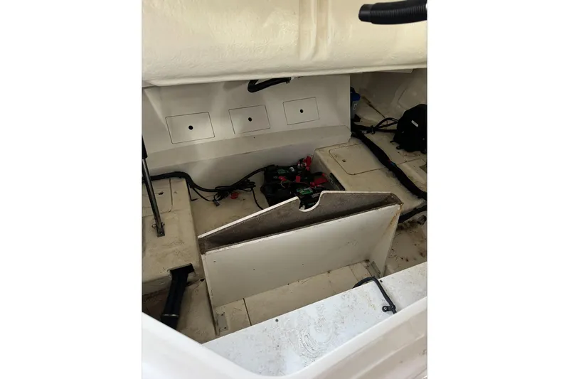  Yacht Photos Pics 2019 Sea Ray SLX 310 Outboard interior compartment with wiring and storage.