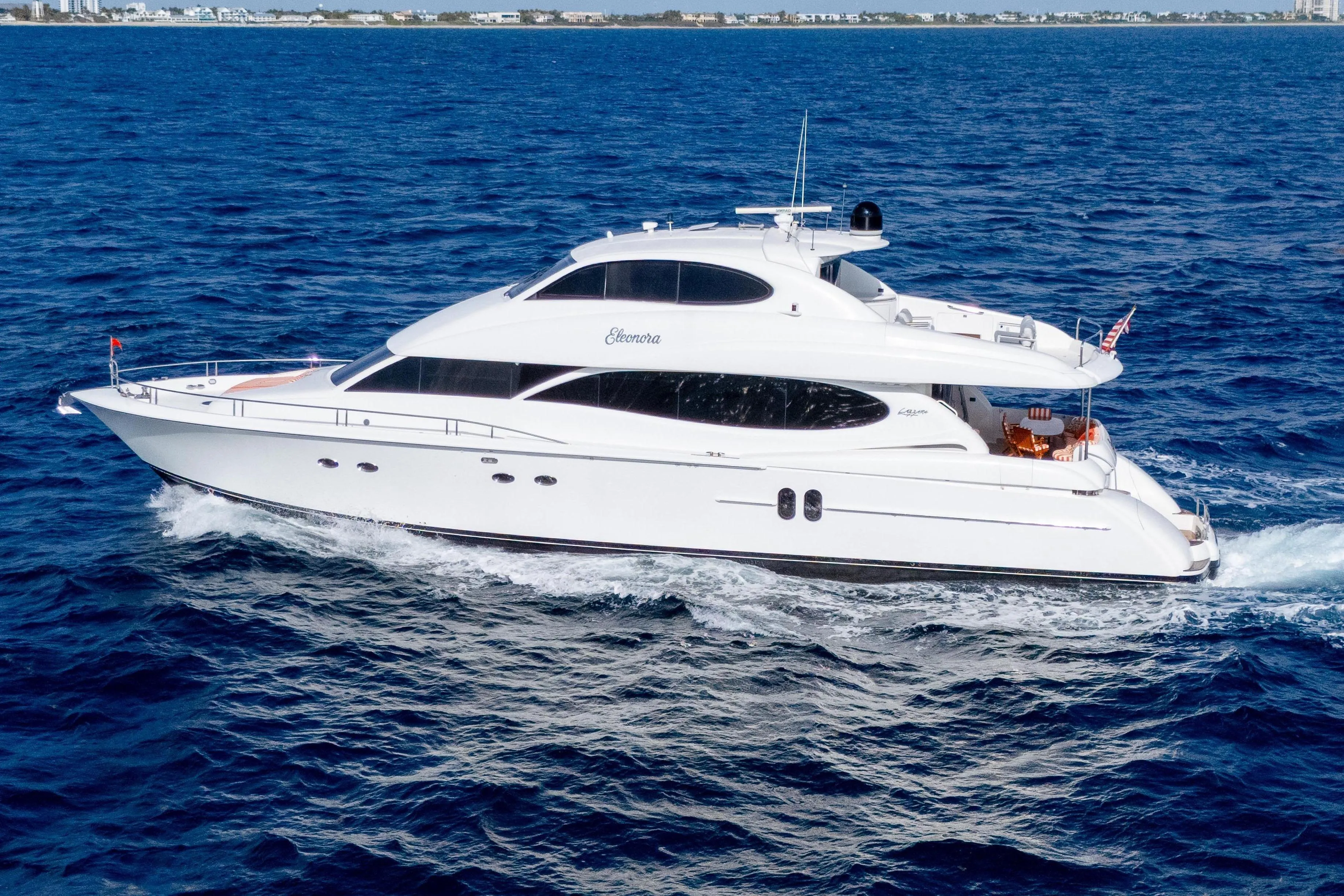 Luxury yacht Lazzara 80 SL 2004 on open sea.