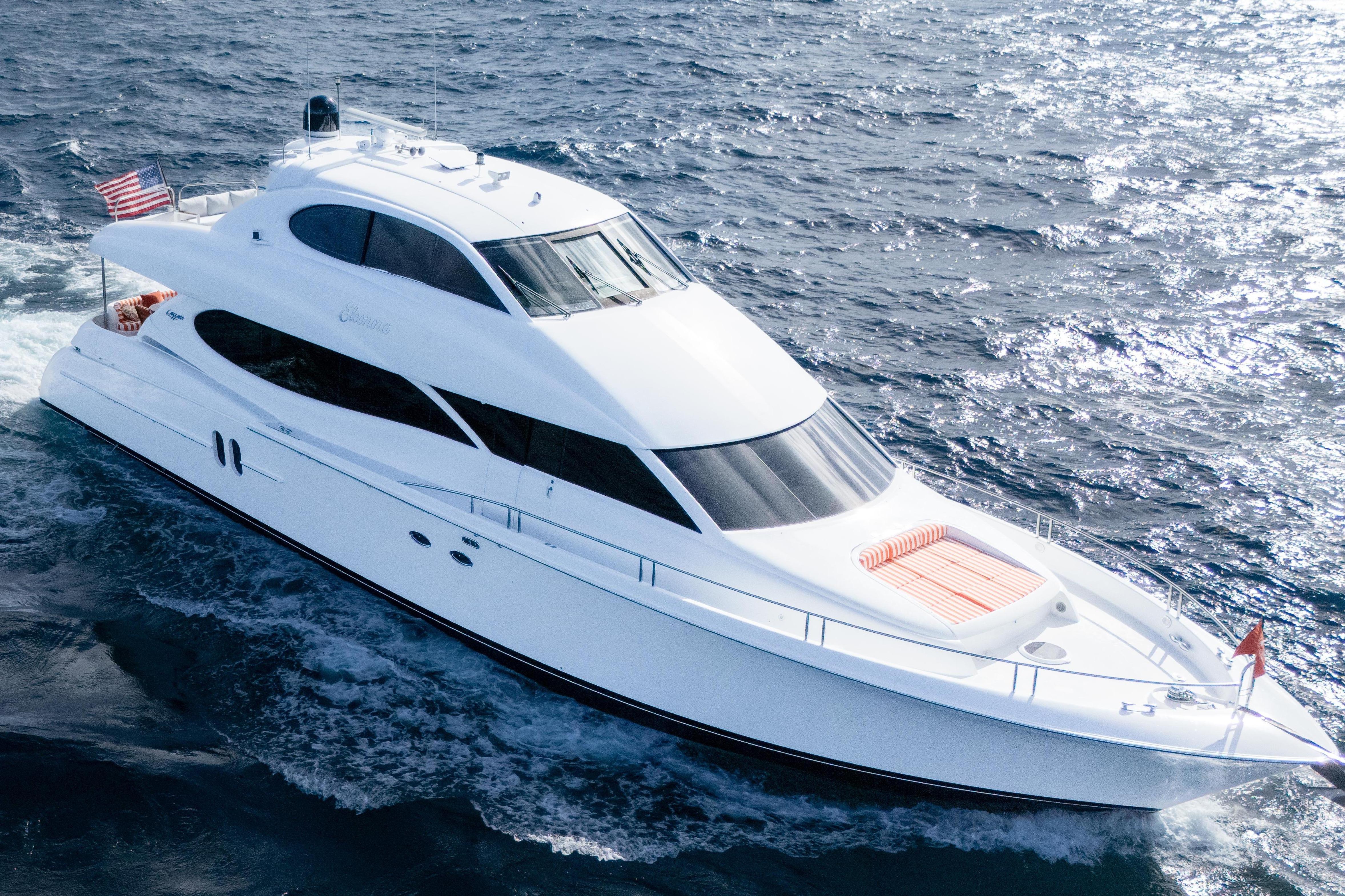 Luxury yacht Lazzara 80 SL 2004 cruising on open sea.