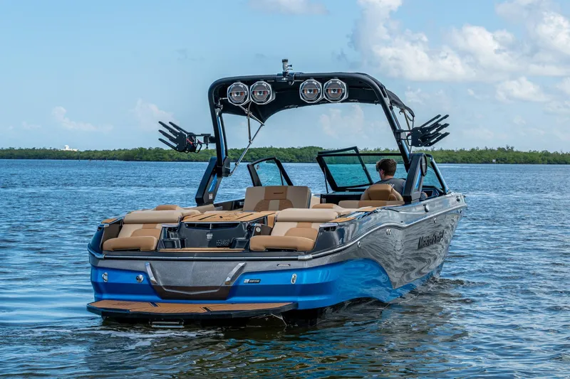  Yacht Photos Pics 2022 MasterCraft X26 boat on water, featuring sleek design and modern amenities.